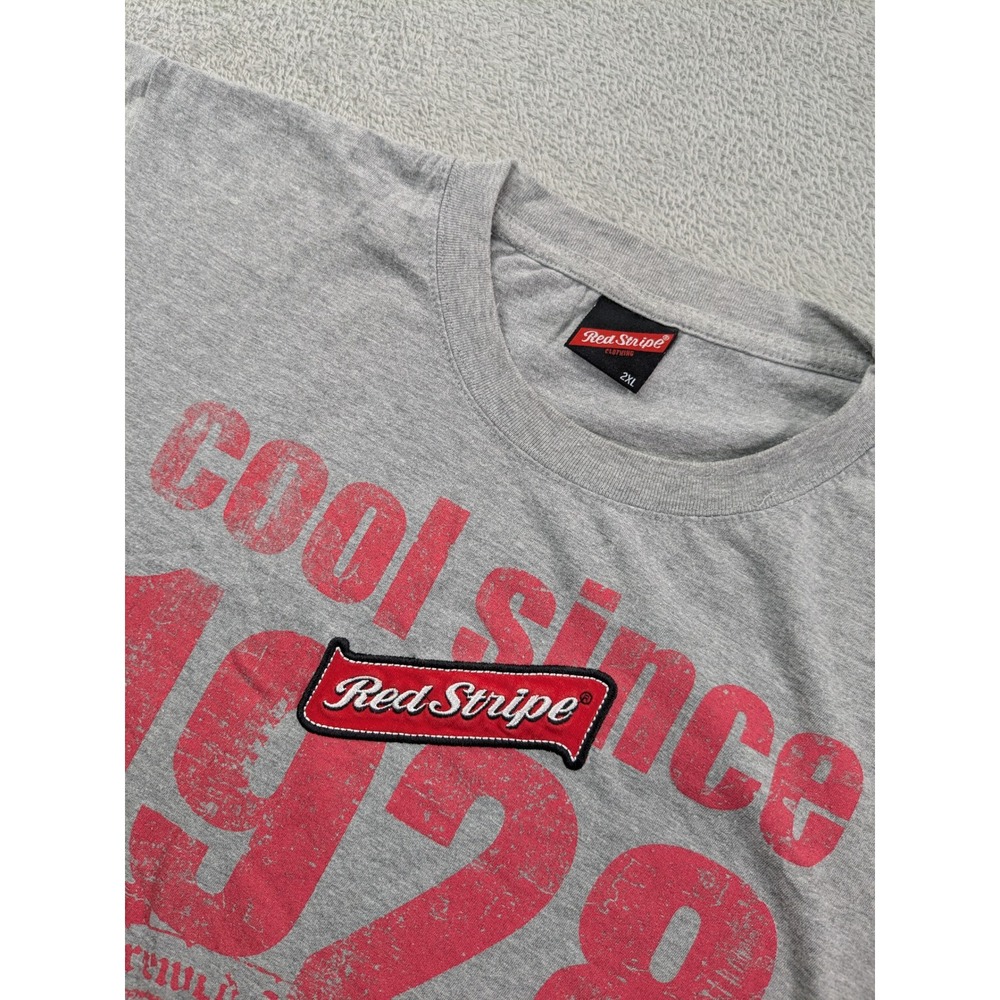 Red Stripe Beer Graphic T-Shirt Mens 2XL Gray Cool Since 1928 Jamaica Lager Tee